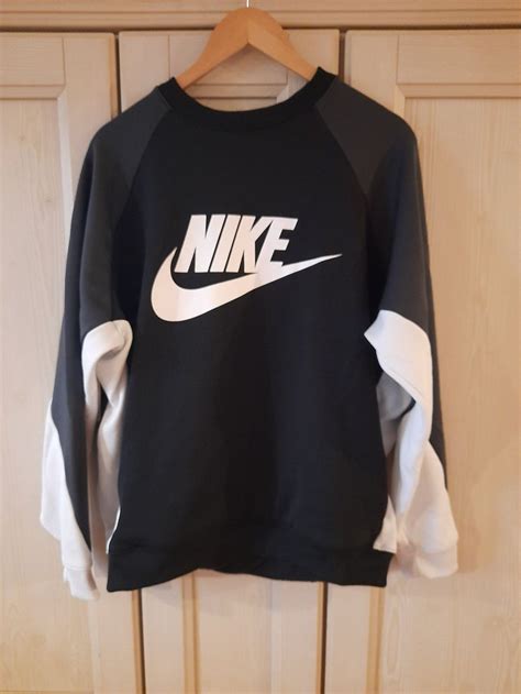 nike top schwarz weisse schrift|Schwarz Oberteile & T.